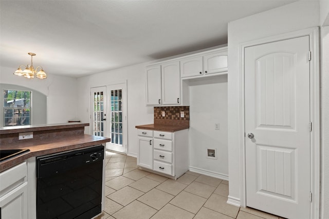 91 Pecan Dr, Pottsboro, TX 75076 - kitchen with dishwasher, a chandelier, white cabinets, light tile patterned floors, and wood counters