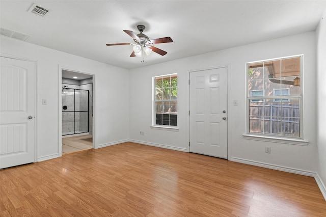 interior space featuring light hardwood / wood-style flooring and ceiling fan