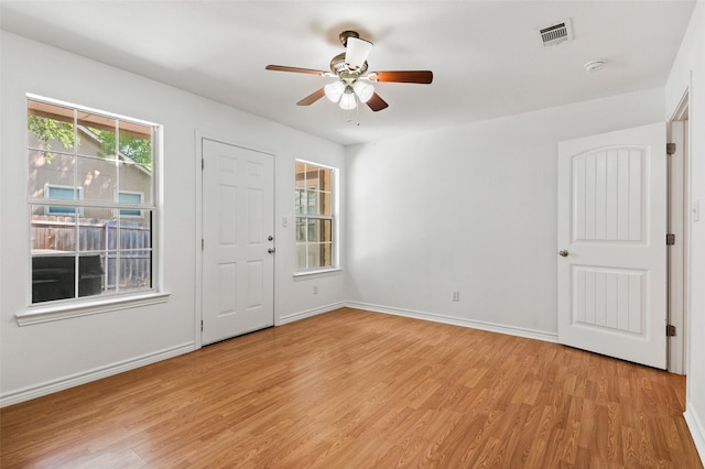 91 Pecan Dr, Pottsboro, TX 75076 - spare room featuring light wood-type flooring, ceiling fan, baseboards, and a smoke detector
