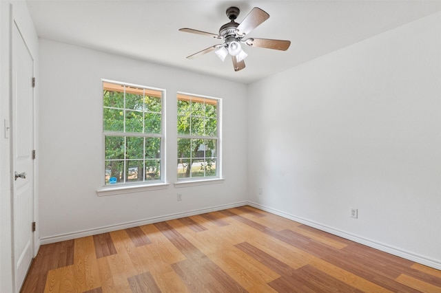 91 Pecan Dr, Pottsboro, TX 75076 - spare room featuring light wood finished floors, baseboards, and a ceiling fan