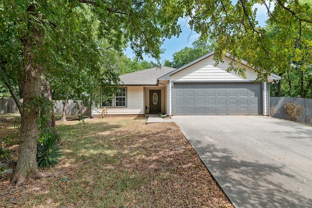 ranch-style home with a garage