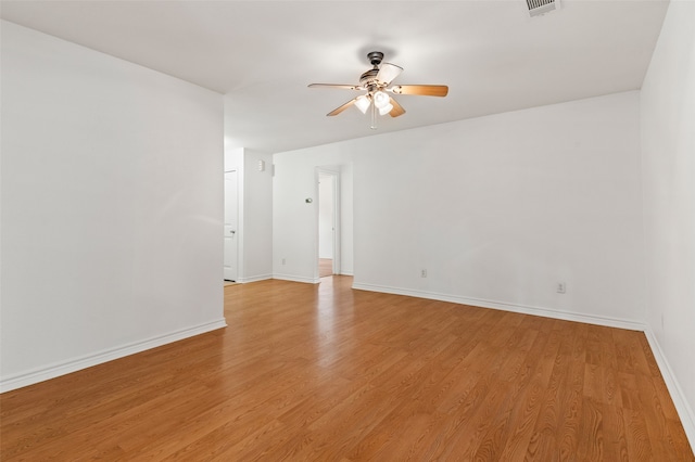 unfurnished room featuring ceiling fan and light hardwood / wood-style floors