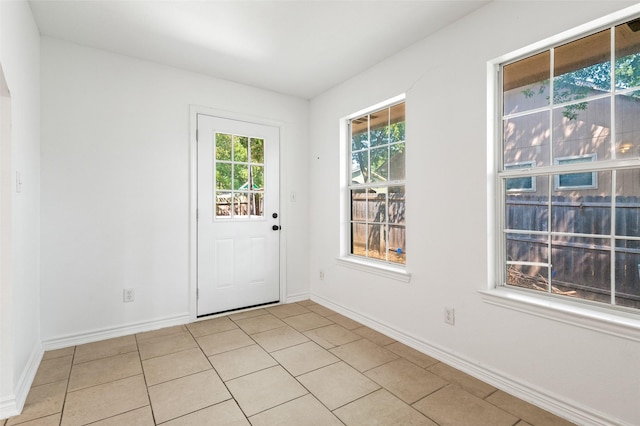 91 Pecan Dr, Pottsboro, TX 75076 - entryway featuring baseboards and light tile patterned floors