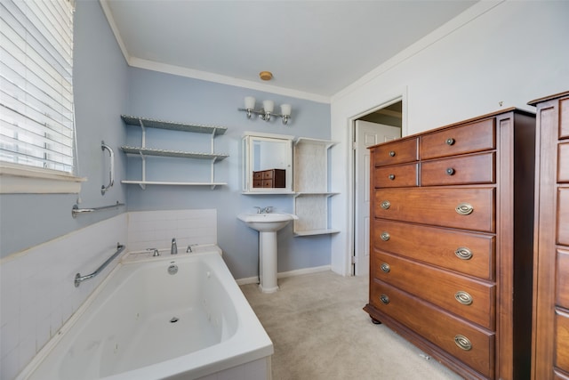 bathroom with a bathing tub and ornamental molding