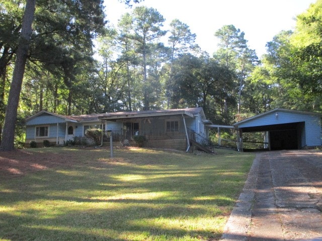 ranch-style house with a front lawn