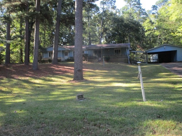 exterior space with a carport