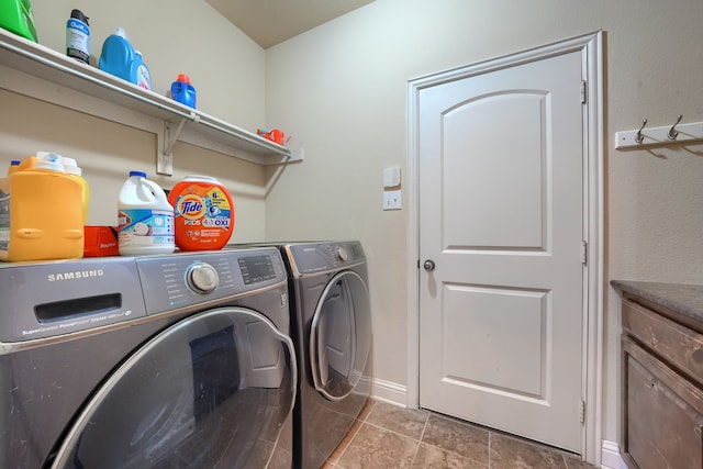 laundry area featuring washing machine and clothes dryer