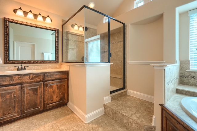 bathroom with vanity, lofted ceiling, plus walk in shower, and tile patterned floors