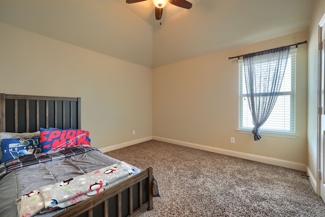 carpeted bedroom featuring ceiling fan and vaulted ceiling