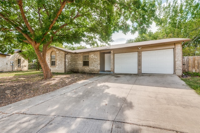 ranch-style home with a garage