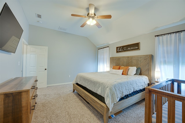 carpeted bedroom with lofted ceiling and ceiling fan