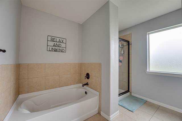 bathroom with tile patterned flooring and plus walk in shower