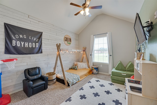 bedroom with light colored carpet, lofted ceiling, and ceiling fan