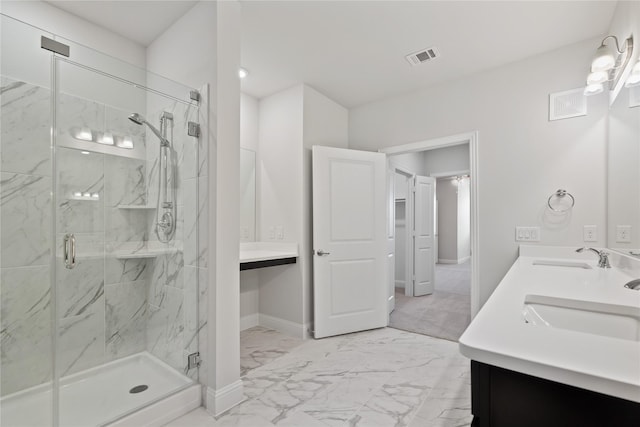 bathroom featuring vanity and an enclosed shower