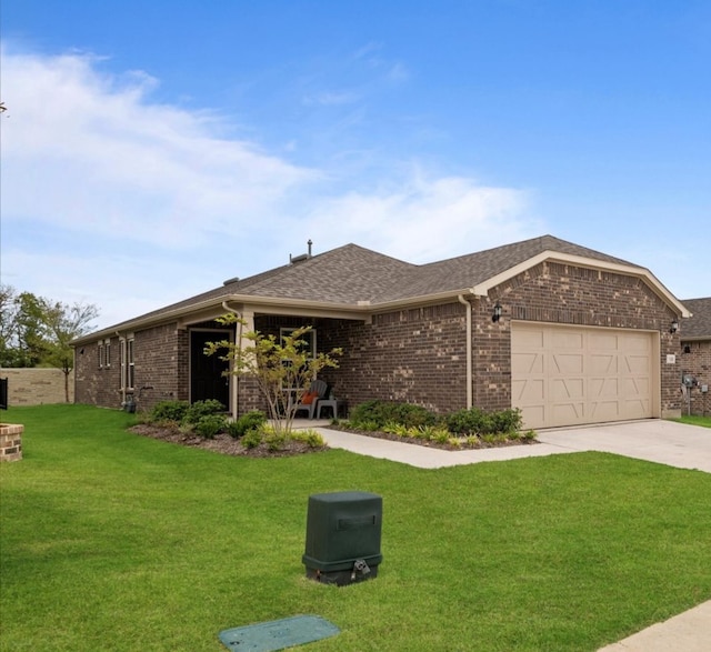 ranch-style house with a garage and a front lawn