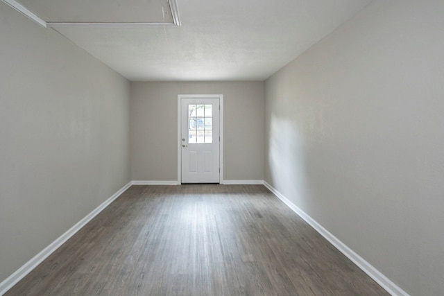 interior space with dark hardwood / wood-style flooring