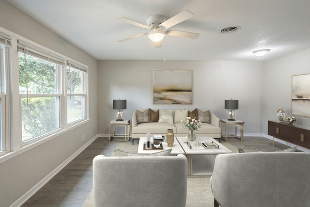 living room with ceiling fan and hardwood / wood-style flooring