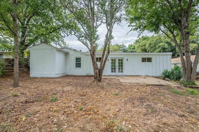 back of house with french doors and a patio area