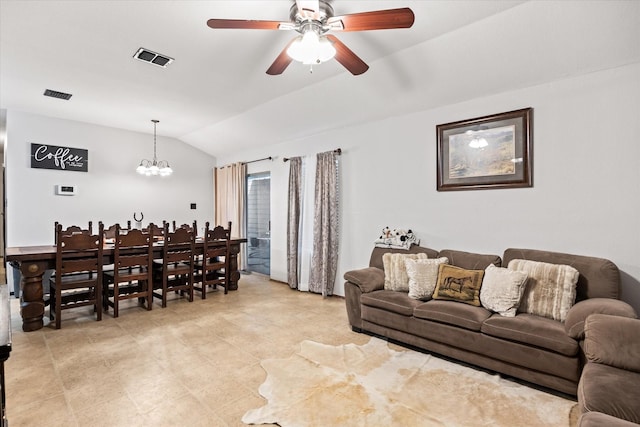 living room with vaulted ceiling and ceiling fan with notable chandelier