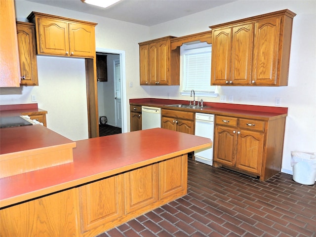 kitchen featuring dishwasher and sink