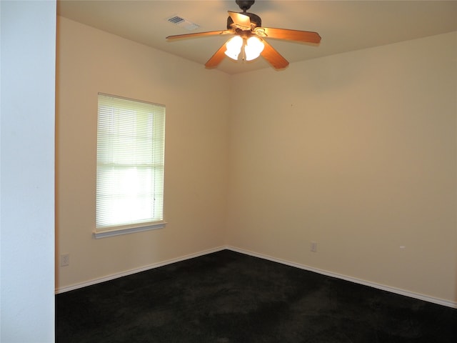 carpeted empty room with ceiling fan