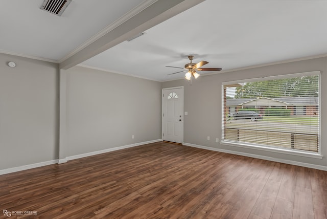 spare room featuring crown molding, beamed ceiling, wood-type flooring, and ceiling fan