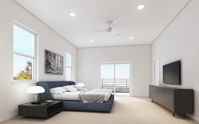 carpeted bedroom featuring multiple windows, ceiling fan, and access to exterior