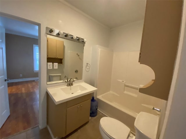 full bathroom featuring shower / bathtub combination, vanity, toilet, and baseboards