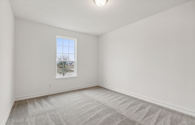 empty room featuring carpet floors