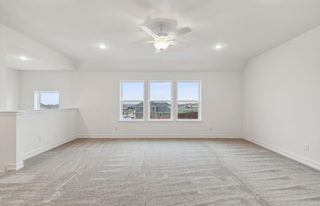 unfurnished room with light carpet and a healthy amount of sunlight