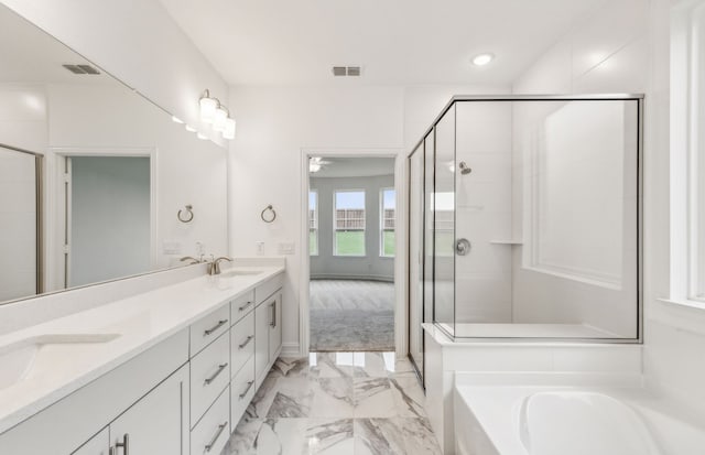 bathroom featuring vanity, ceiling fan, and shower with separate bathtub