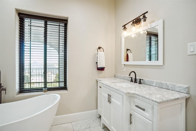 bathroom featuring a bathtub and vanity