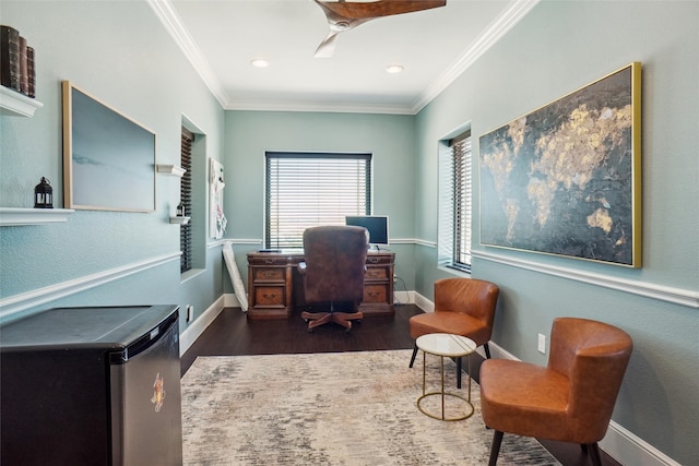 home office featuring ornamental molding and dark hardwood / wood-style floors