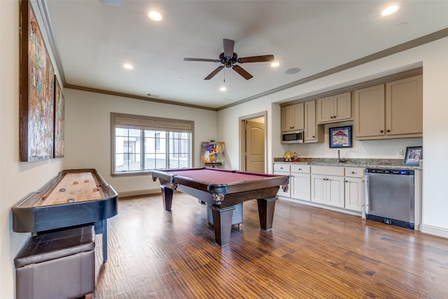 recreation room featuring billiards, crown molding, sink, wood-type flooring, and ceiling fan