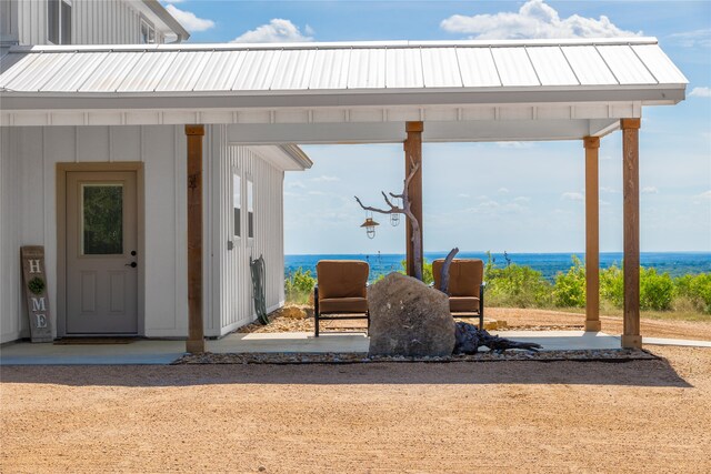 exterior space with a water view