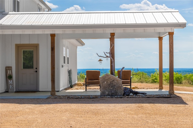 view of patio featuring a water view