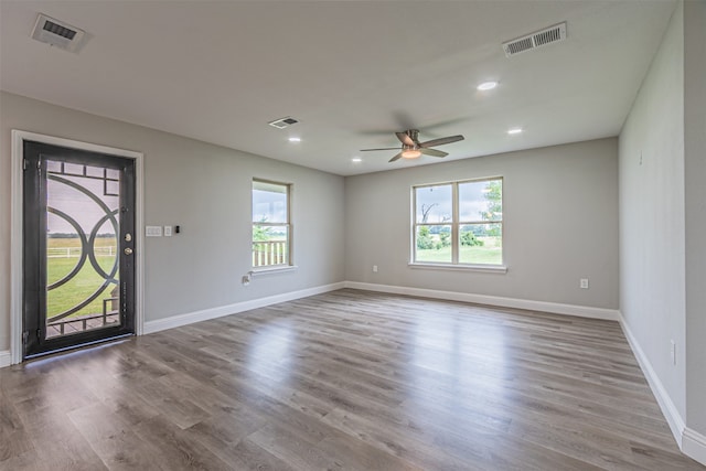 interior space featuring ceiling fan and hardwood / wood-style flooring