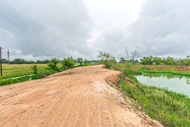 view of road featuring a water view