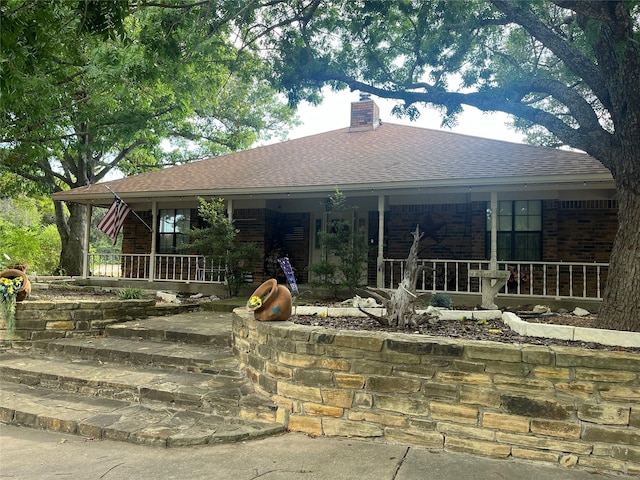 view of front of home featuring covered porch