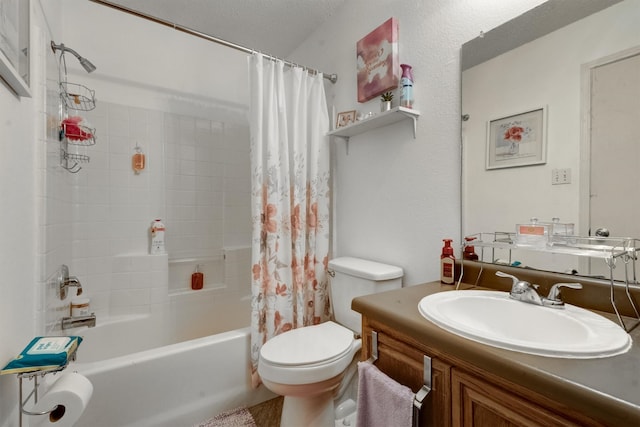 full bathroom featuring vanity, toilet, a textured ceiling, and shower / bath combo