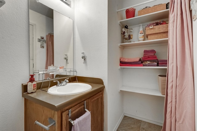 bathroom featuring vanity and tile patterned floors