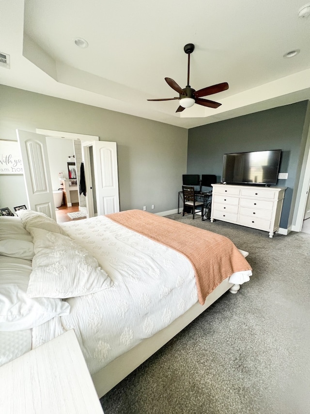 bedroom with ceiling fan and carpet