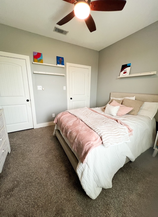 carpeted bedroom with ceiling fan