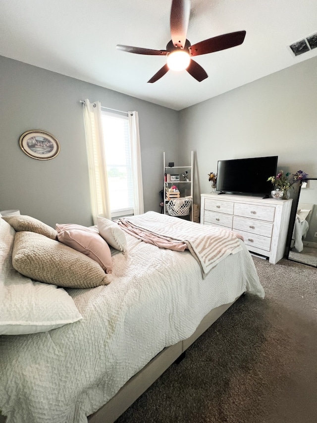 bedroom featuring ceiling fan and carpet floors