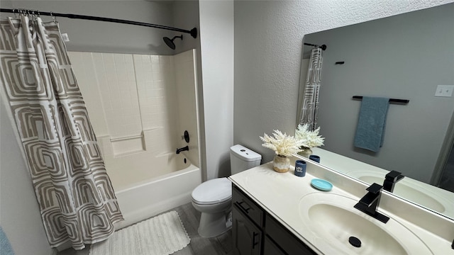 full bathroom featuring vanity, toilet, and shower / bathtub combination with curtain