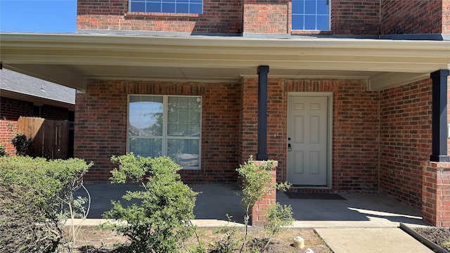 doorway to property with a porch