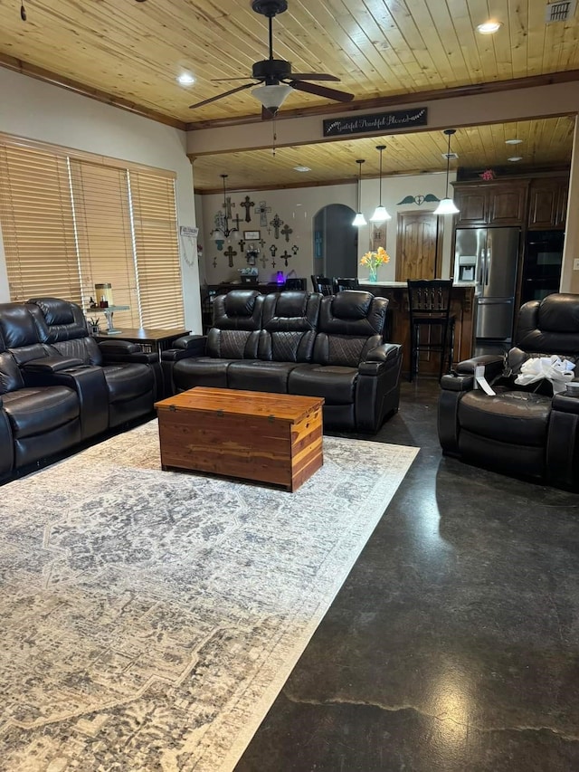 living room featuring ceiling fan and wooden ceiling