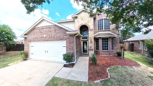 view of front facade featuring a garage and a front yard