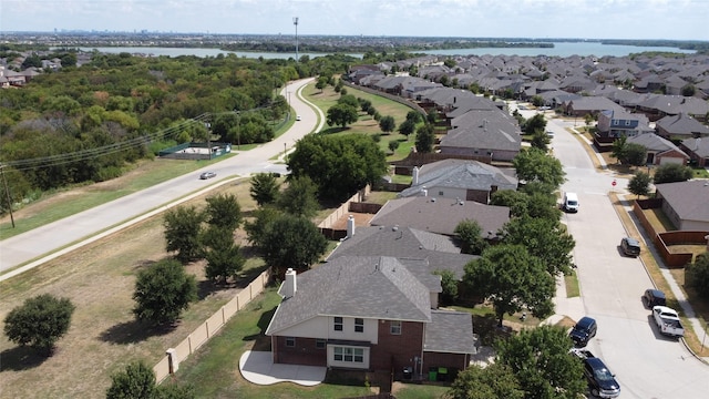 aerial view with a water view and a residential view