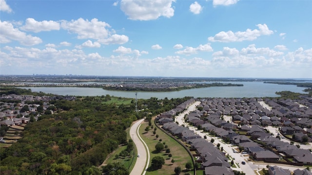 bird's eye view with a water view and a residential view